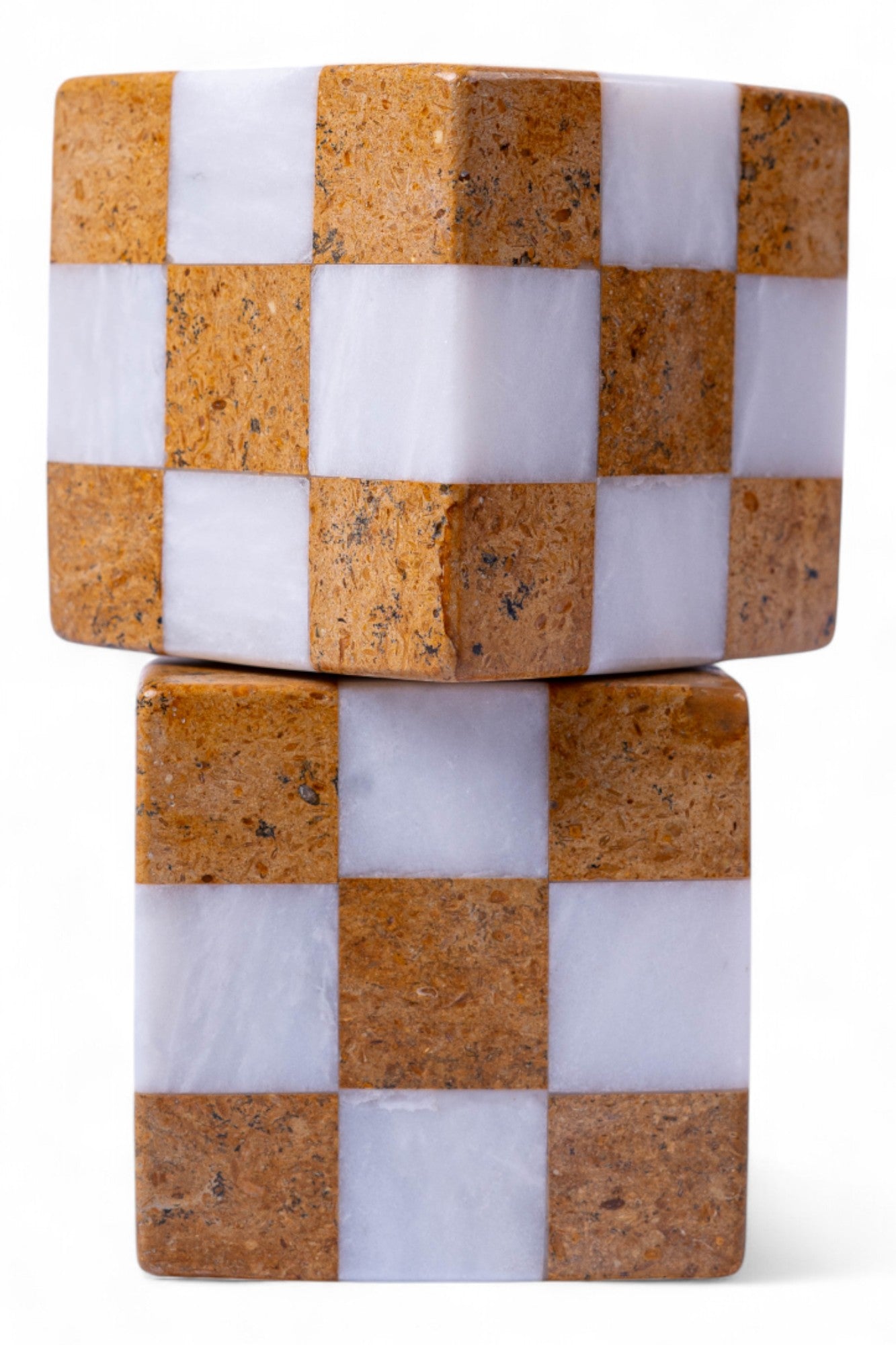 Stack of checkered stone blocks with alternating brown and white squares on a white background