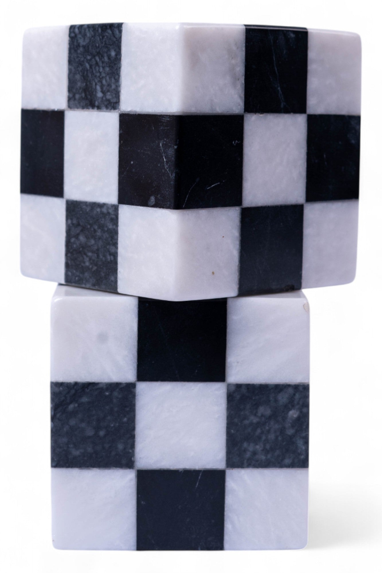 Checkered patterned soap bar with black and white squares on a white background