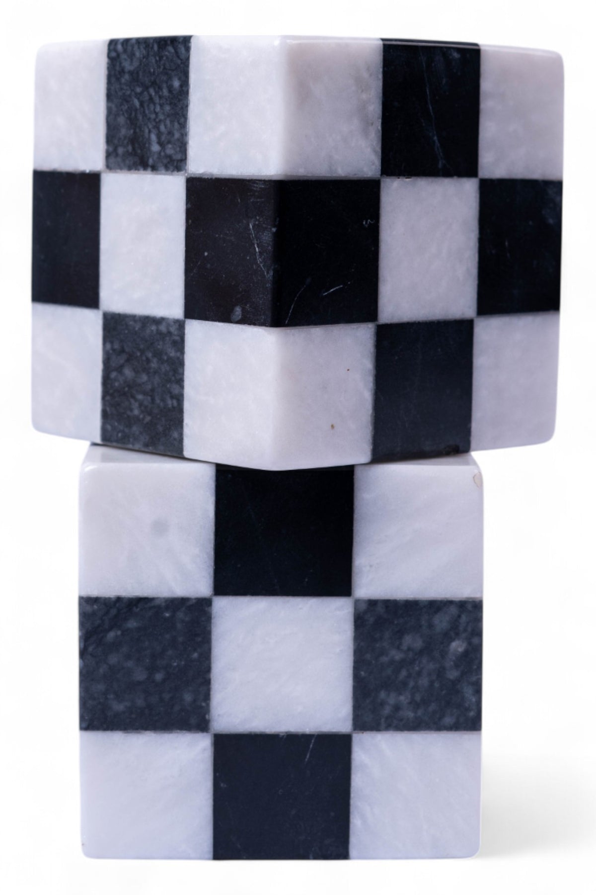 Checkered patterned soap bar with black and white squares on a white background