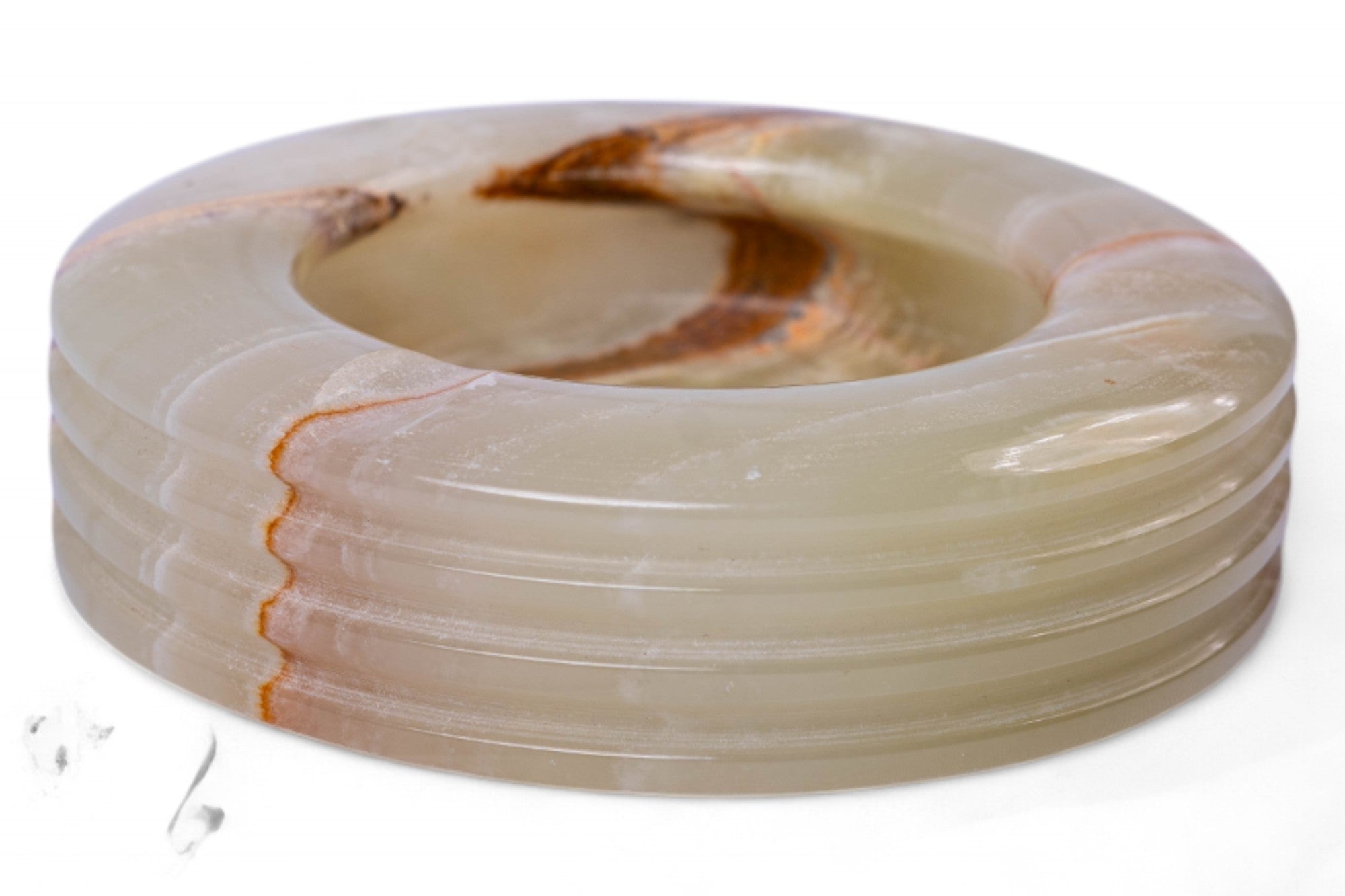 Coiled white cable with a brown swirl on a white background