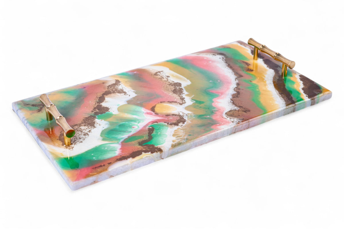 Colorful marbled design tray with gold accents on a white background