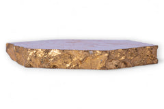 Decorative tray with gold base and purple stone top on a white background
