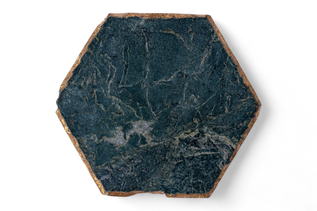Hexagonal dark stone tile on a white background
