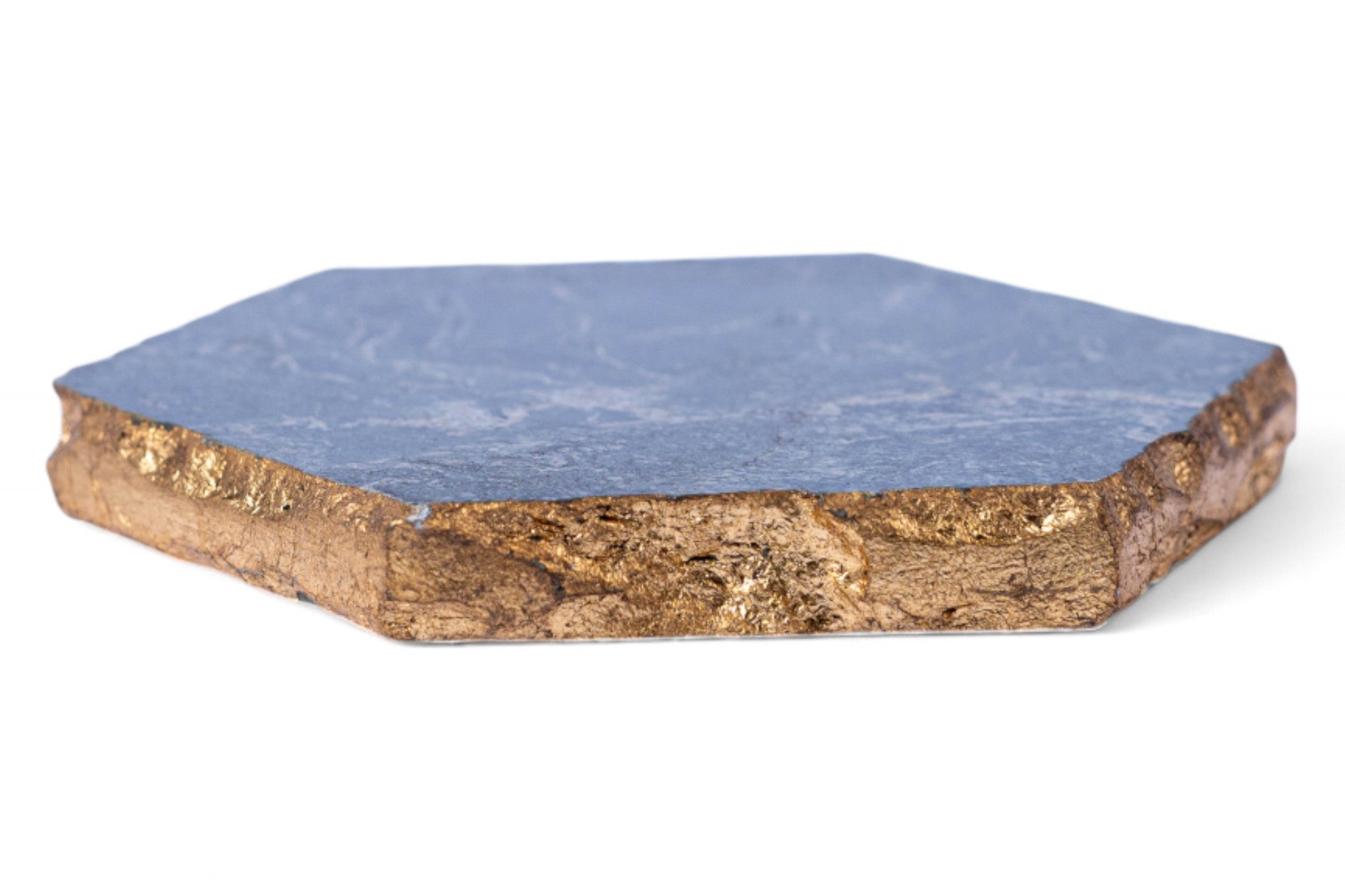 Hexagonal stone coaster with blue top and brown base on a white background