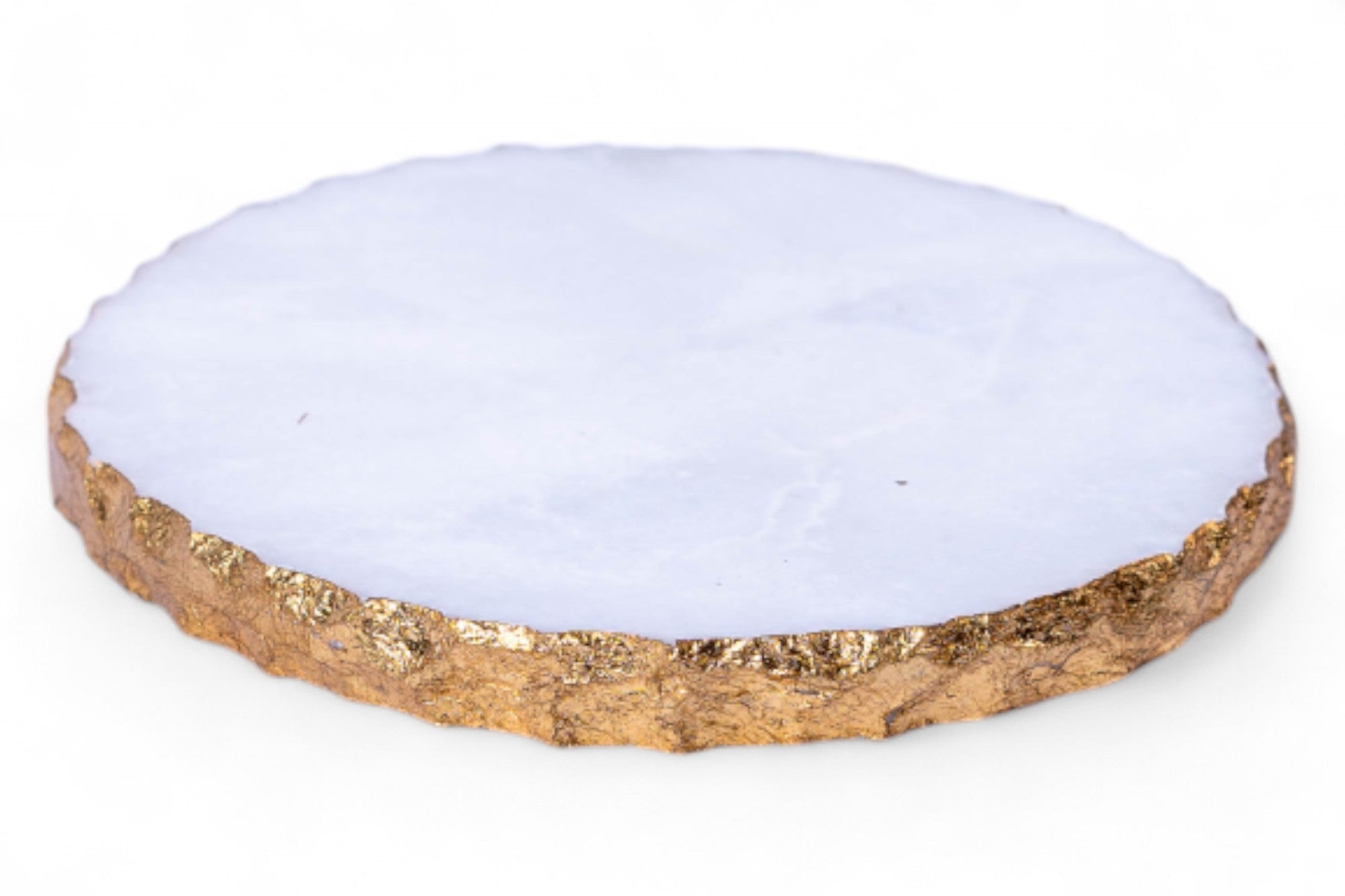 Round coaster with white center and gold edge on a white background