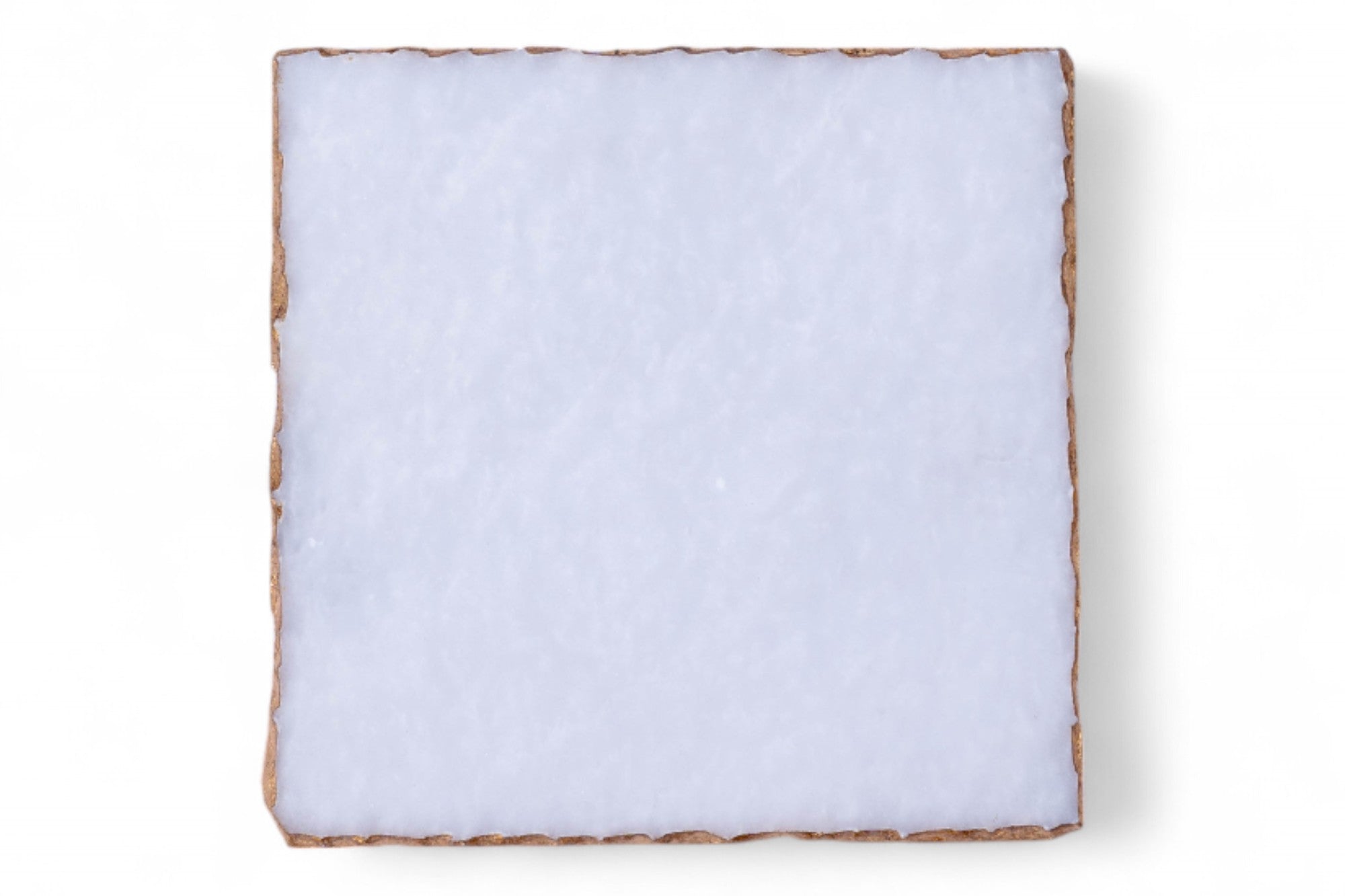 Square piece of white material on a white background