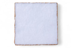Square piece of white material on a white background