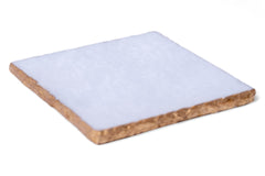 Square cutting board with white surface and wooden edge on a white background