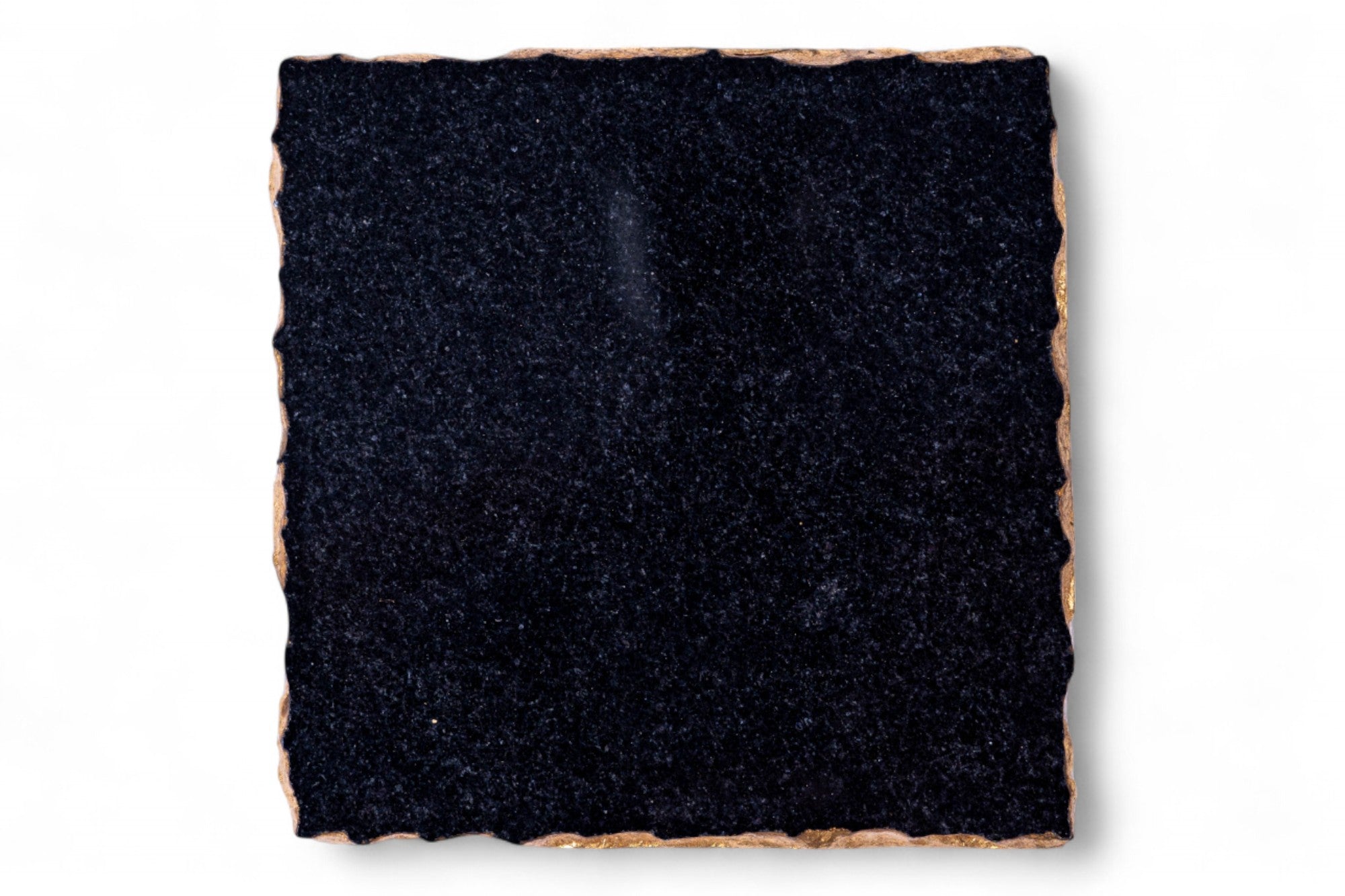 Square piece of black felt on a white background