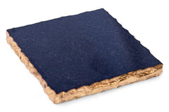 Square stone coaster with blue top and brown edge on a white background