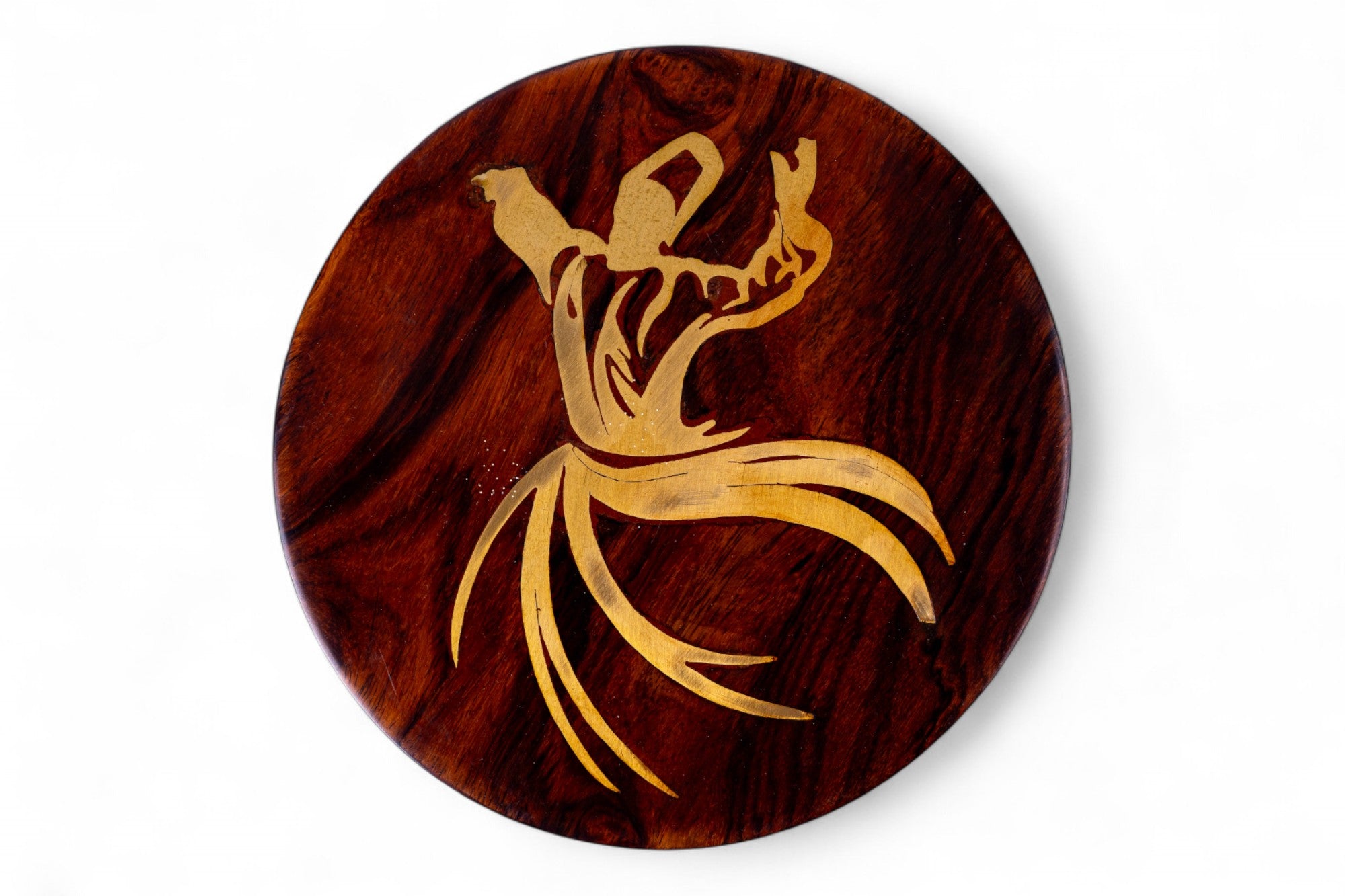 Wooden coaster with a gold deer antler design on a white background