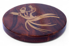 Wooden coaster with a gold leaf design on a white background