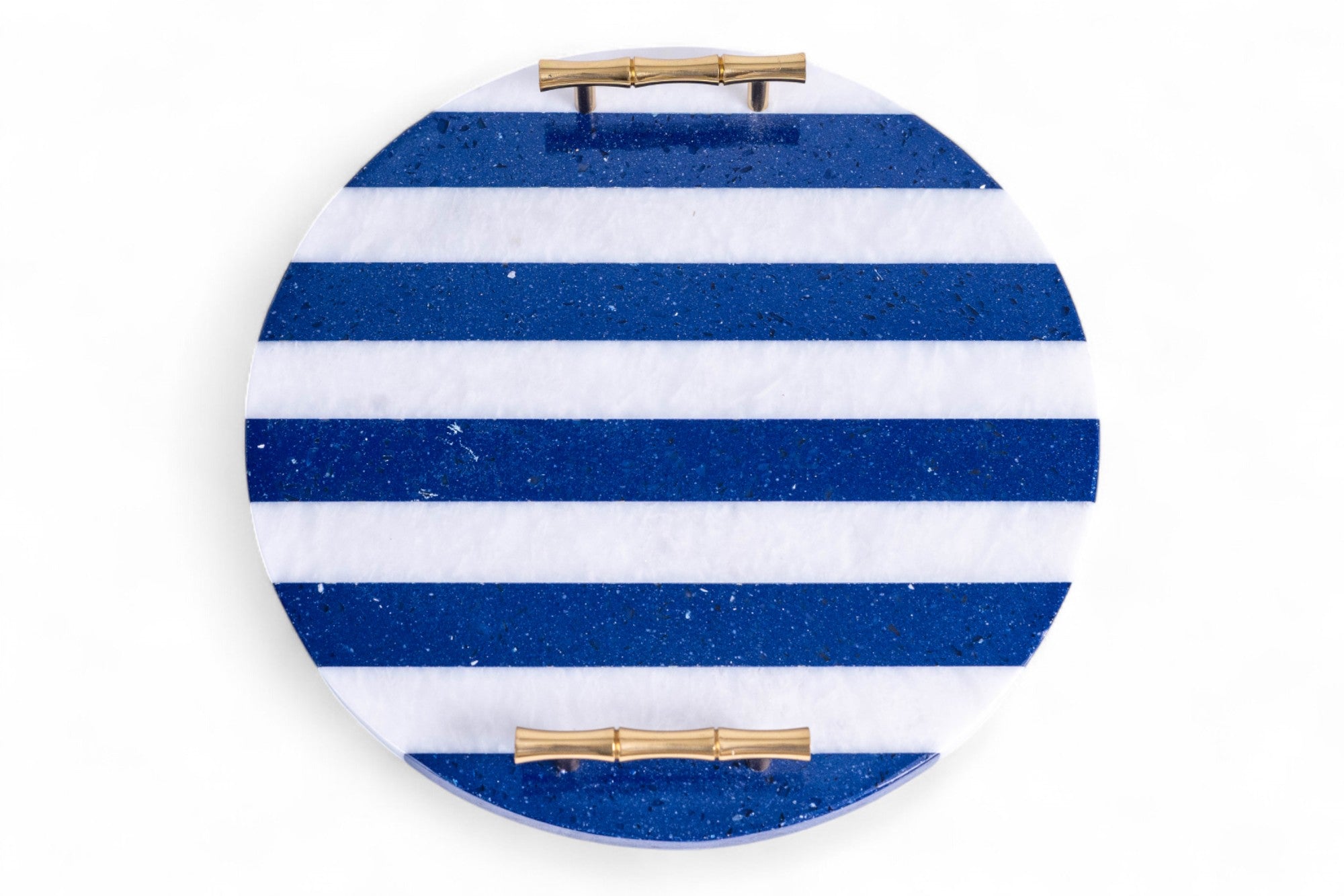 Round blue and white striped object with gold accents on a white background