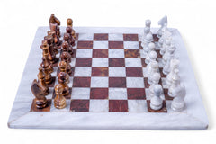 Wooden chess set with checkered board on a white background