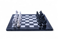 Black and white chess pieces on a checkered board
