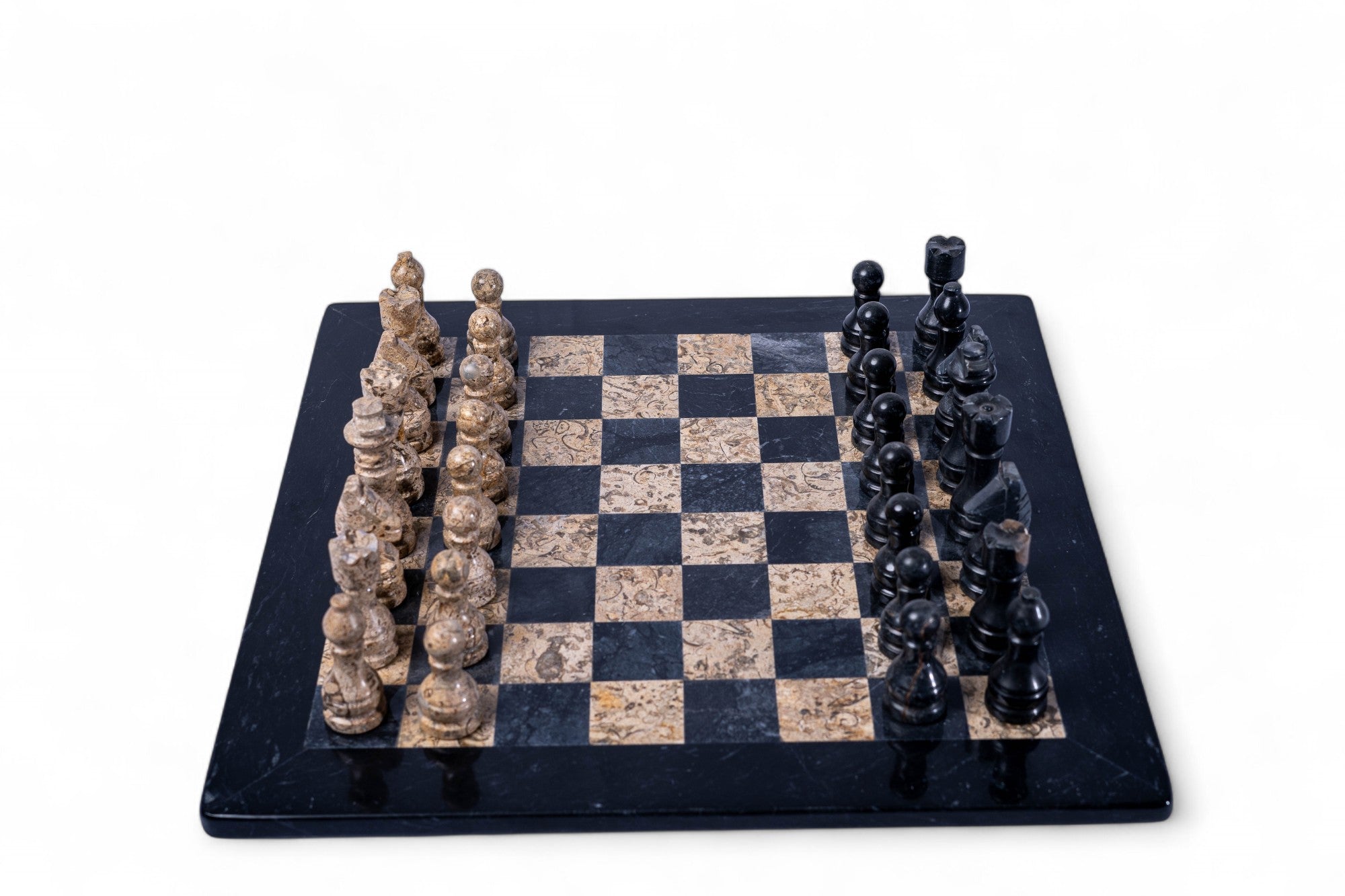 Marble chess set with black and white pieces on a checkered board.