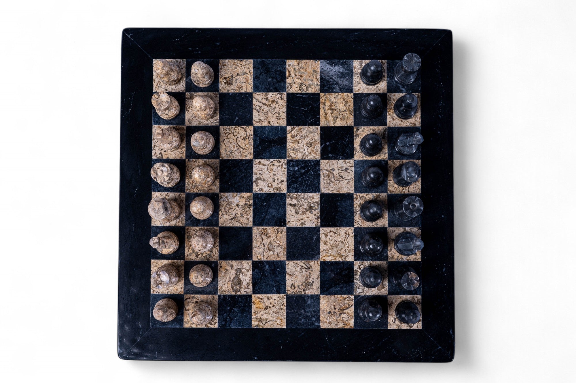 Checkered game board with stone pieces on a white background