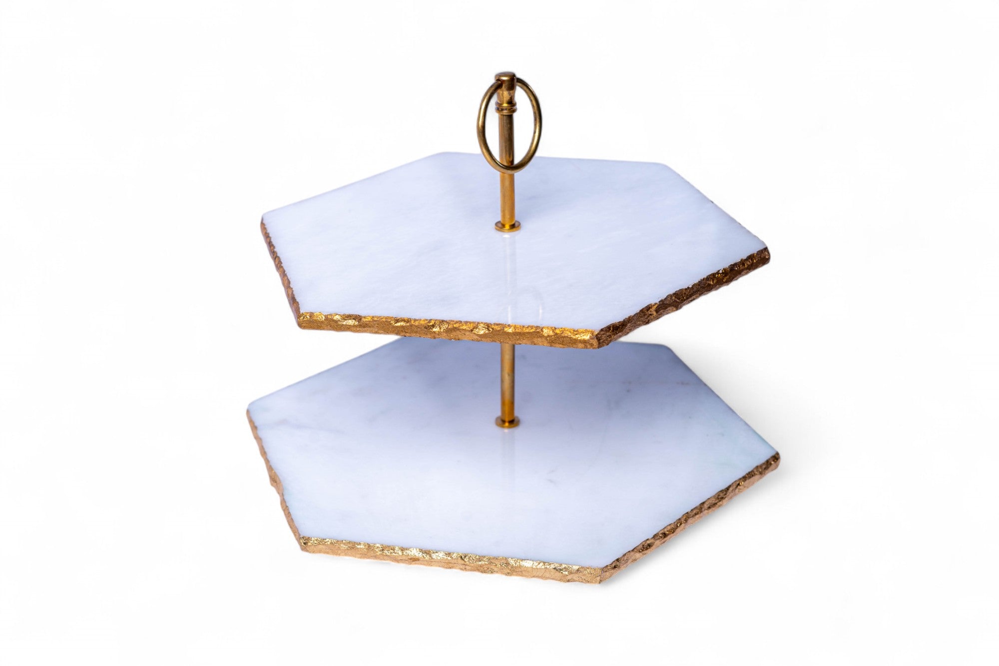 Two-tiered serving tray with gold accents on a white background