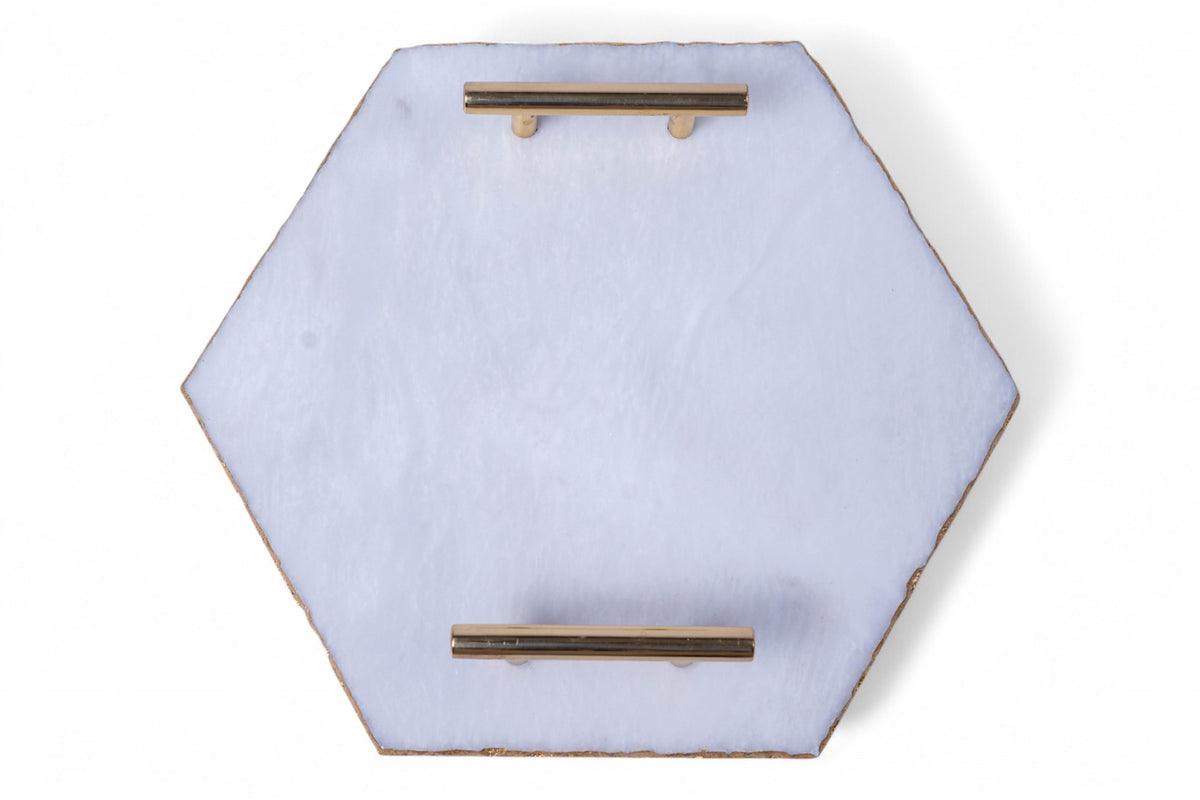 Hexagonal wall art piece with gold accents on a white background