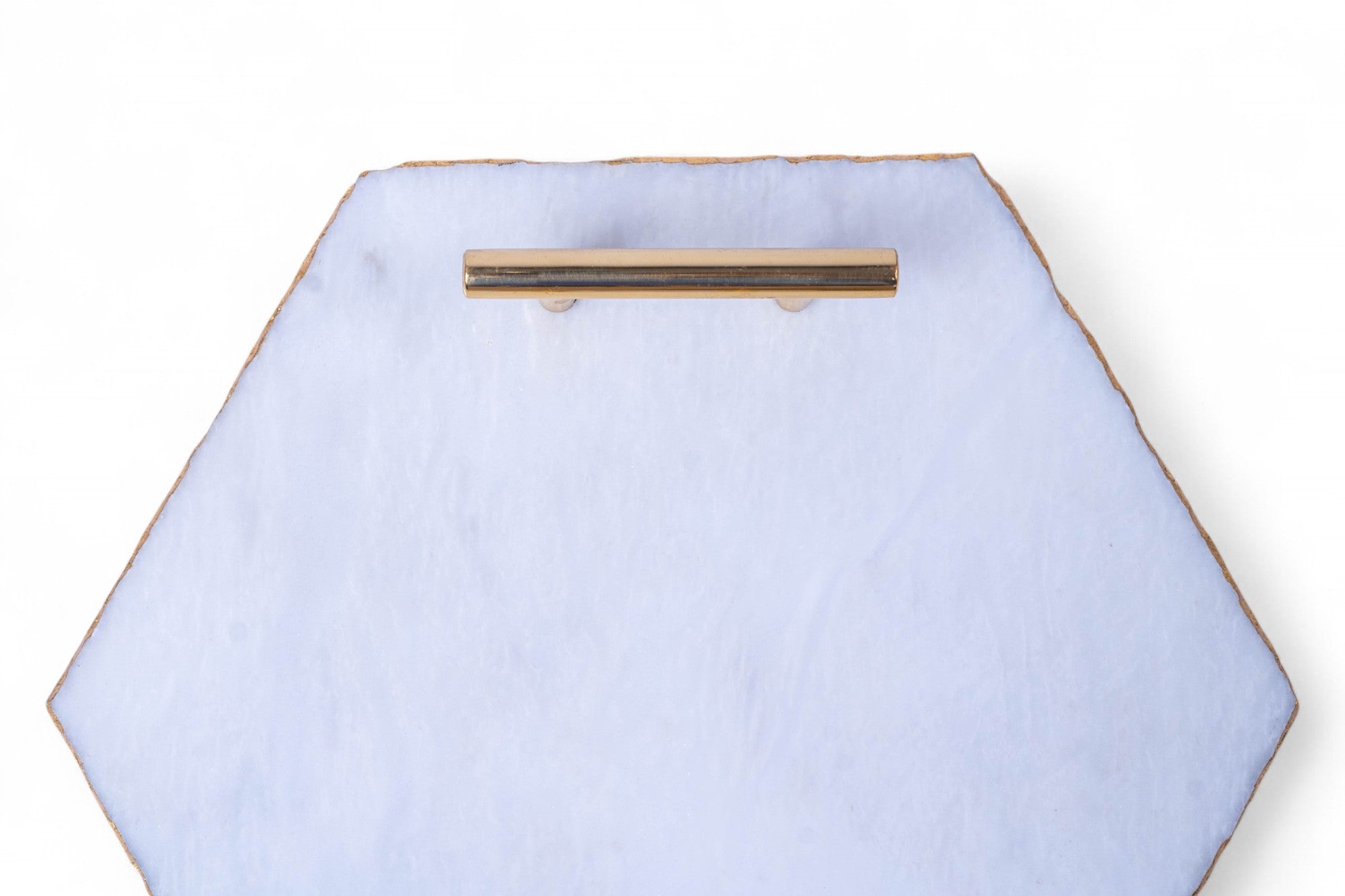Hexagonal light blue tray with a gold handle on a white background