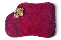 Red textured pouch with a gold leaf-shaped clasp on a white background