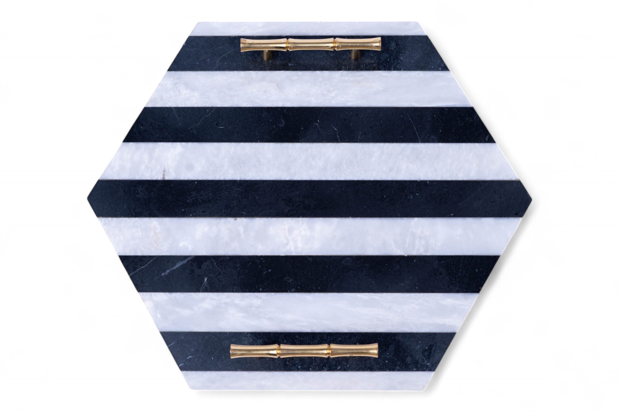 Hexagonal tray with black and white striped pattern and gold handles on a white background