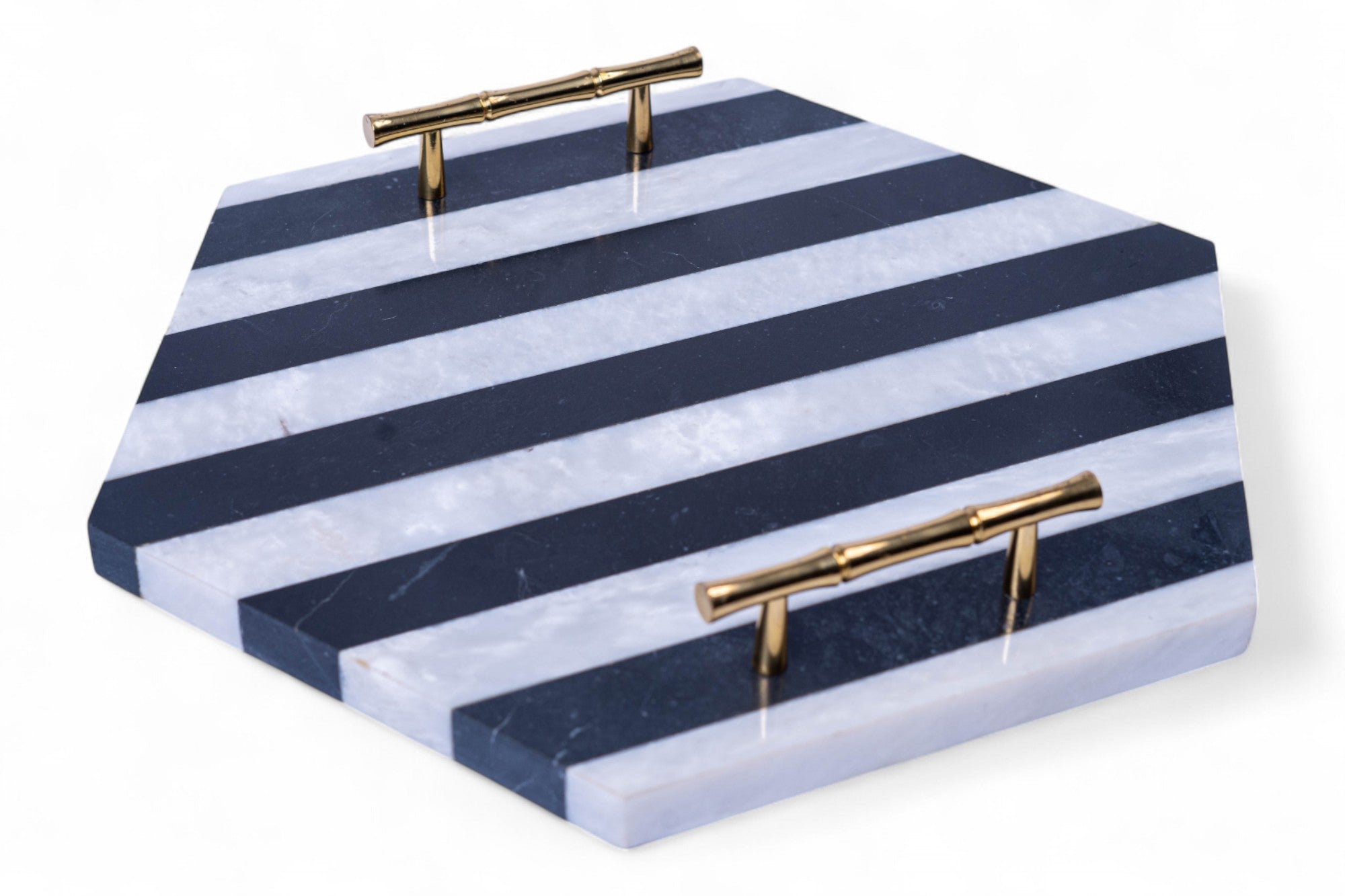 Navy and white striped tray with gold handles on a white background
