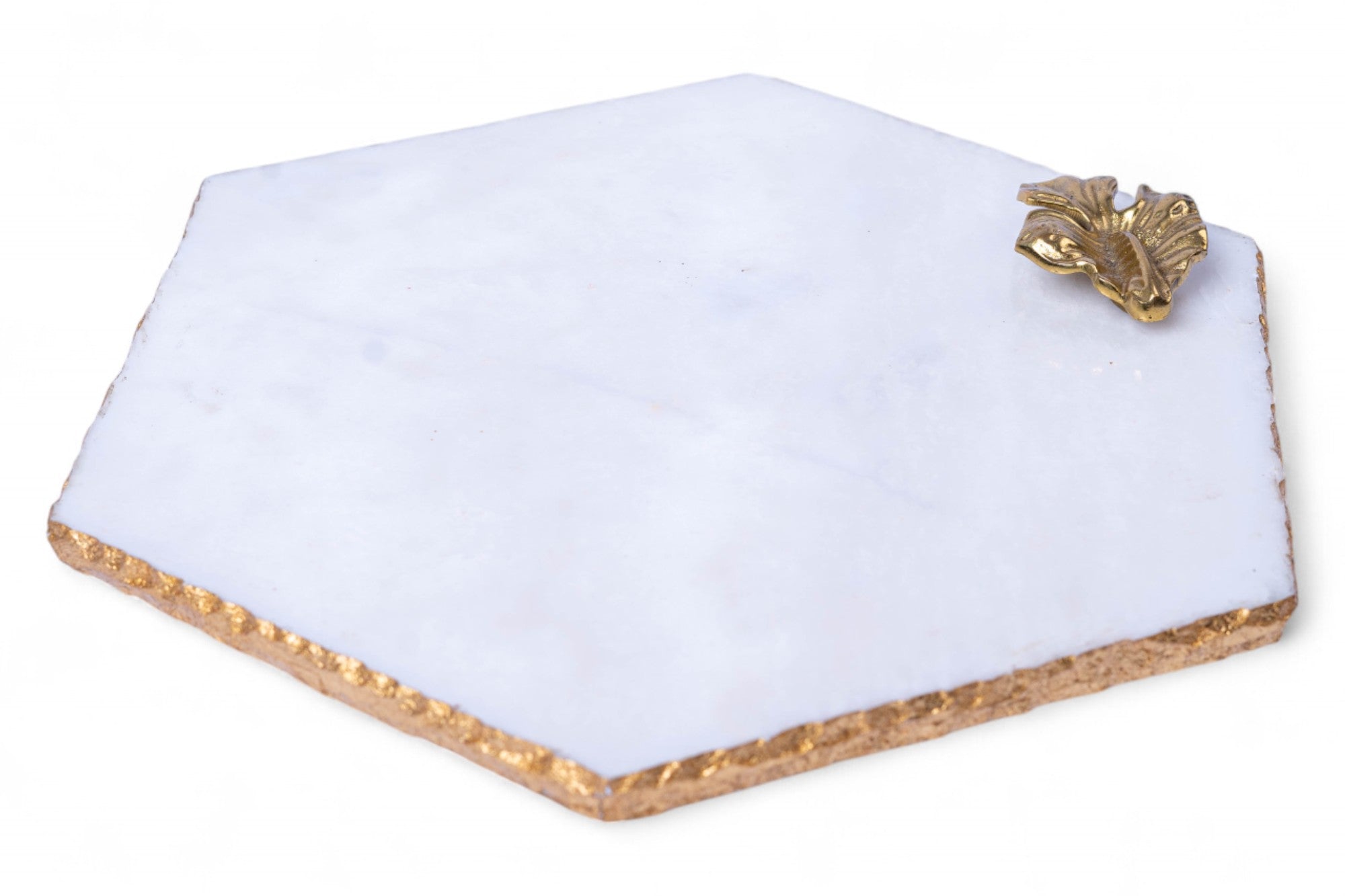 Hexagonal white stone with gold trim and decorative element on a white background