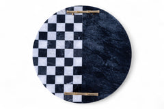 Round marble tray with black and white checkered pattern and gold accents on a white background