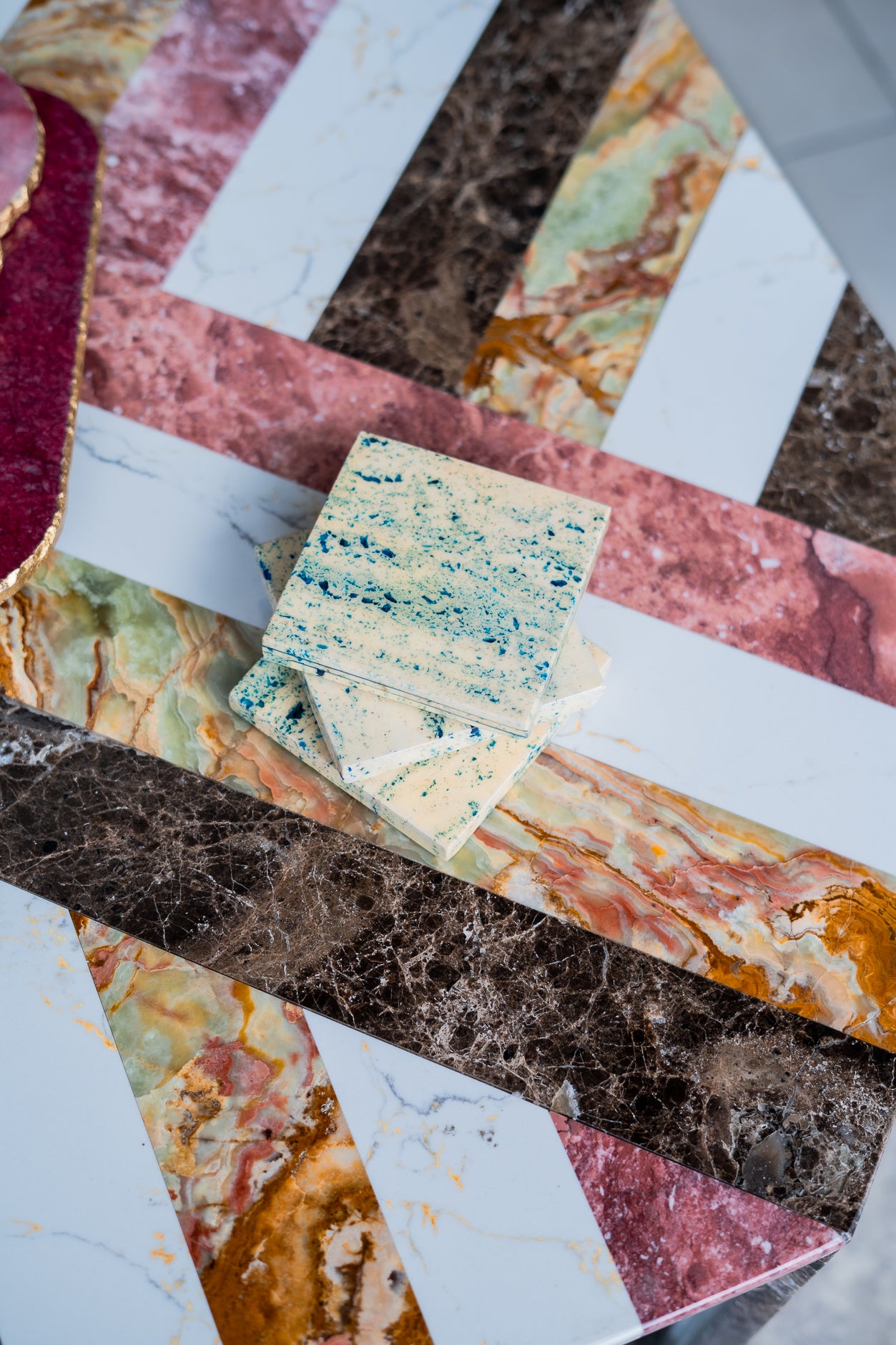 Close-up of various marble and stone samples with different colors and patterns.